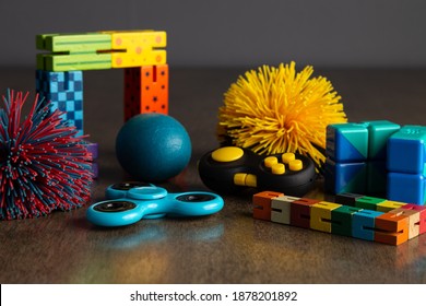 Childs fidget toys in different shapes, colors and styles.