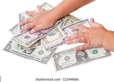 Child's hand and cash U.S. dollars isolated on a white background
