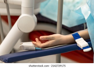 Child's Hand On The Operating Table