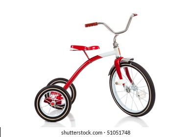 A child's red tricycle on a white background - Powered by Shutterstock