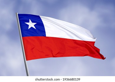 Chile flag isolated on sky background. close up waving flag of Chile. flag symbols of Chile.