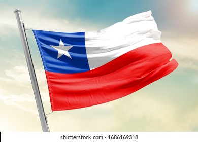 Chile national flag cloth fabric waving on the sky with beautiful sun light - Image