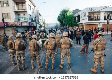 QUILPUÉ, CHILE - OCTOBER 20, 2019 - Military take the streets under the State of Emergency during protests of the "Evade" movement against the government of Sebastian Piñera
