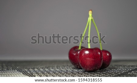 Chilean cherries on textured cover on white background 商業照片 © 