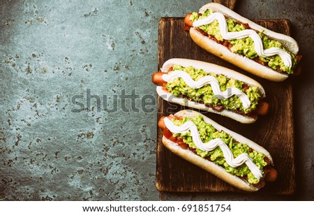 Chilean Completo Italiano. Hot dog sandwich with tomato, avocado and mayonnaise. Top view, copy space, copy space
