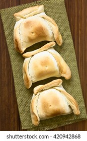 Chilean Empanada, A Baked Pastry Stuffed With Meat, Photographed Overhead With Natural Light