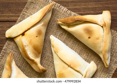 Chilean Empanada, A Baked Pastry Stuffed With Meat, Photographed Overhead With Natural Light