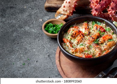 Chilean food. Baked crabmeat crab meat with cheese, cream and bread. Traditional dish of chilean coast. Pastel or chupe de sentolla o king crab. - Powered by Shutterstock