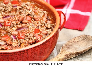 Chili Con Carne In A Red Ceramic Pot. 