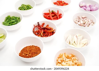 Chili, Garlic, Shallots, Dried Shrimp, Cayenne Pepper, Food Processor On A White Background