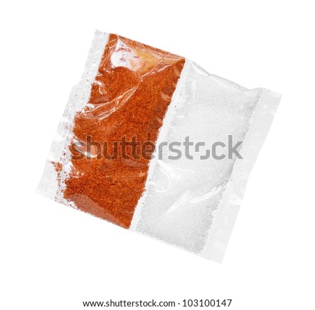 Chili powder and sugar in bag isolated on white background