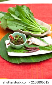 Chili Sauce, Fly Chili With Tuna On Disk And Red Background