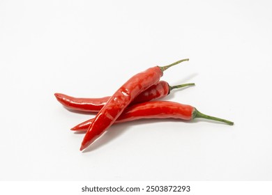 Chili spur pepper ( Cayenne pepper, long fed pepper, spur pepper) on white background