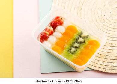 Chilled Cold Jelly Pudding With Fresh Fruit, Lychee. Strawberry, Orange,  And Mixed Cocktail Fruit On Top In Plastic Transparent Bento Box Dessert Menu