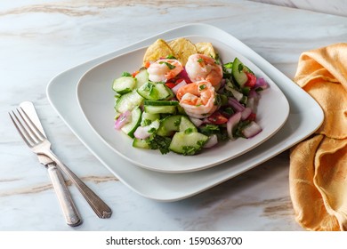Chilled spicy Peruvian ceviche with shrimp and plantain banana chips