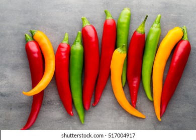 Chilli Pepper On The Grey Background.