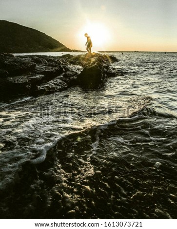 Similar – Image, Stock Photo Man with pipe in midnight sun at the fjord