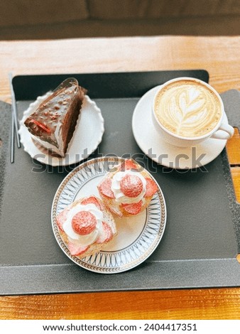 chilling at magnate cafe with strawberry cake and coffee