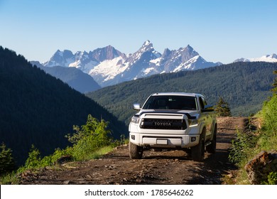Chilliwack, British Columbia, Canada - July 25, 2020: Toyota Tacoma riding on the 4x4 Offroad Trails in the mountains during a sunny summer morning.