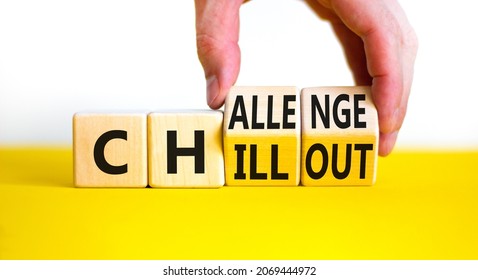 Chillout or challenge symbol. Businessman turns the wooden cube and changes the word chillout to challenge. Beautiful white background. Business and chillout or challenge concept. Copy space.
