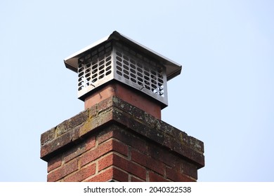 Chimney Cap Topper On Bricks With Terra Cotta Liner