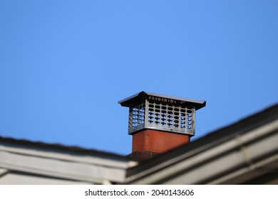 Chimney Cap Topper On House Roof Terra Cotta Liner Blue Sky