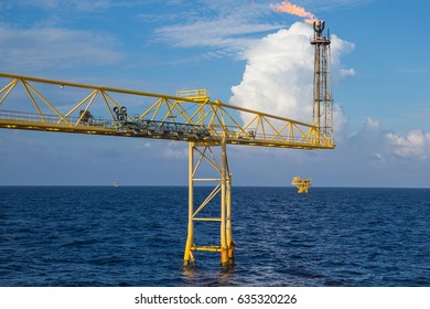 Chimney fire offshore Industry oil and gas production petroleum pipeline. - Shutterstock ID 635320226