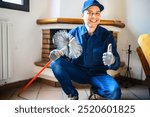 Chimney sweep happily cleaning a fireplace, ensuring safety for homeowners in winter