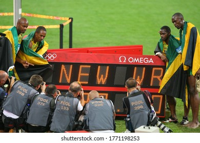 
China Beijing August 2008 Summer Olympic Games: (LR) Asafa Powell, Nesta Carter, Usain Bolt And Michael Frater Won The Gold Medal As Champion In The Men's 4 X 100m Flag Race.