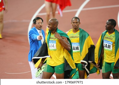 China Beijing August 2008 Summer Olympic Games: Team Consisting Of Powel, Carter, Frater Joy Men 4 X 100m Asafa Powell, Nesta Carter, Usain Bolt And Michael Frater Won The Gold Medal.