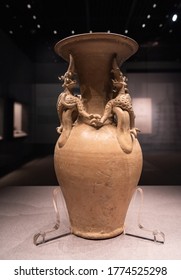 CHINA BEIJING - May 5, 2020: Yue Ware Celadon Entwined Dragon Ying(Jar), Ancient China Tang Dynasty.