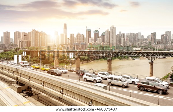 China Chongqing elevated light rail, modern\
city traffic perspective.