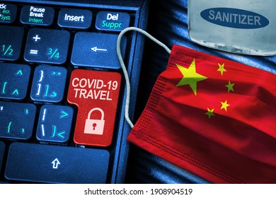 China COVID-19 Coronavirus Travel Restrictions Concept Showing Red Button Warning On Keyboard With Flag Face Mask And Hand Sanitizer. New Normal In Global Travel.