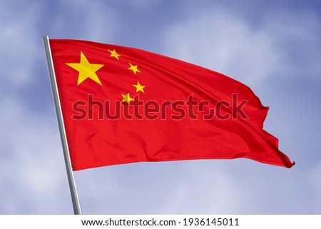 China flag isolated on sky background. close up waving flag of China. flag symbols of China.