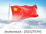 China flag wavering in beautiful clouds with building skyline. The flag with drone shot in beautiful sky. China national flag for independence day.