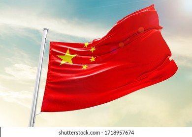 China national flag cloth fabric waving on the sky with beautiful sky - Image