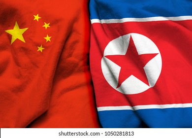 China And North Korea Flag Together