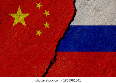 China And Russia Flags Painted On Concrete Wall