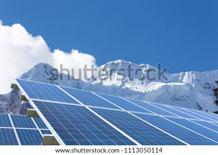 China Sichuan, outdoor snow mountain range and solar generator combination, sustainable development of new energy