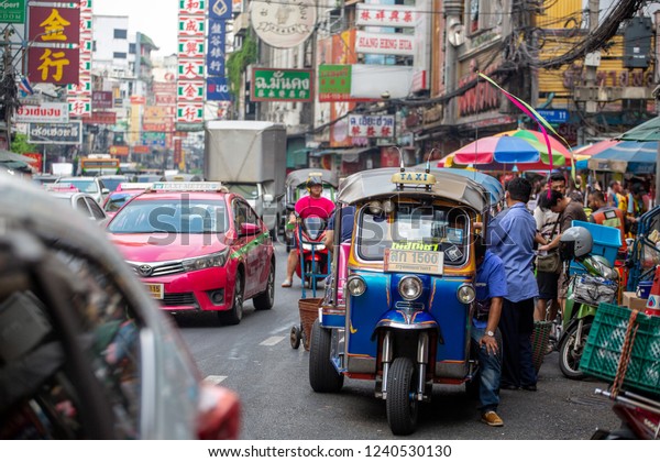 China town in\
Bangkok, Thailand : Thursday 15 November 2018, Tuk Tuk taxi parking\
at Yaowarat road in China\
town