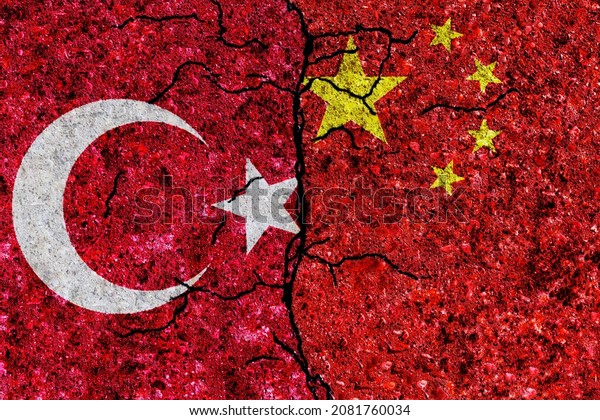 China and Turkey painted flags on a wall with\
grunge texture. Turkey and China conflict. Turkey and China flags\
together. China vs Turkey