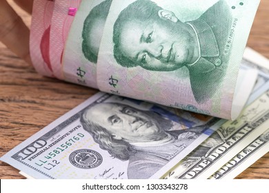 China And USA Finance Trade War Talk Or Tariff Discussion Metaphor, US Dollar Banknotes Face Up To Chinese Yuan Banknotes, Confront Of World Major Commerce Market Countries.