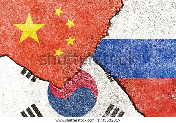 China VS Russia VS South Korea national flags
icon on broken weathered wall with cracks, abstract international
country political economic relationship conflicts pattern texture
background wallpaper