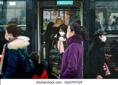 CHINA,CHENGDU,Yinghui Rd.-JANUARY 23,2020: Coronavirus Epidemic In China .People Wearing Face Masks. Novel Coronavirus (2019-nCoV), People In White Medical Face Mask