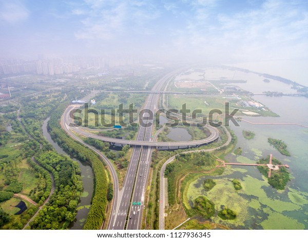 \
In China\'s Jiangsu, a large highway\
overpass, a bird\'s eye view of the bird\'s eye\
view