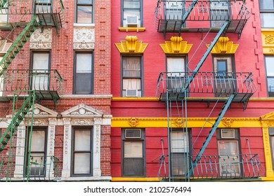 Chinatown, Manhattan, New York City, New York, USA. Fire escapes on buildings in Chinatown.