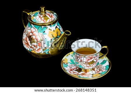 Chinaware tea pod and small drinking bowls isolated with clipping path