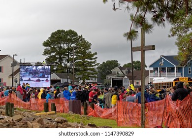 CHINCOTEAGUE, VIRGINIA - JULY 25, 2018: The Crowd Waits In Rainy Weather For The Chincoteague Wild Pony Swim. This Is An Annual Event To Raise Money For The  Volunteer Fire Company.  