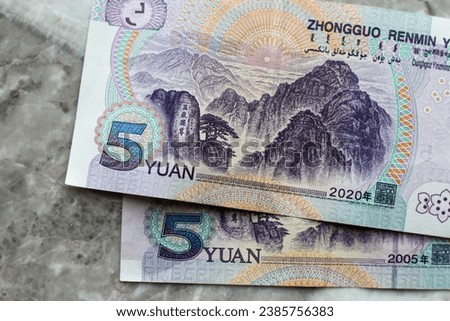 Chinese banknotes of 5 Yuan, 50 Yuan and 100 Yuan. 