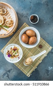 Chinese Breakfast With Rice Porrige, Tea Eggs And Dim Sum, Top View